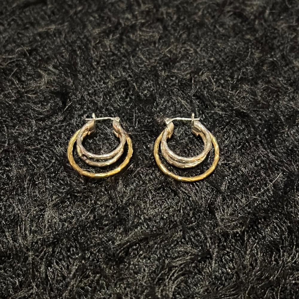 Gold & silver three dimensional hoops. 1 inch in circumference. Good condition.